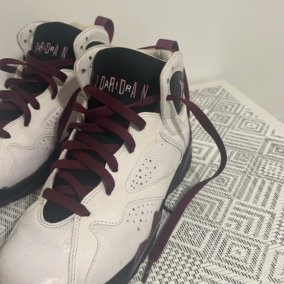Purple and white Jordan Retro 7
